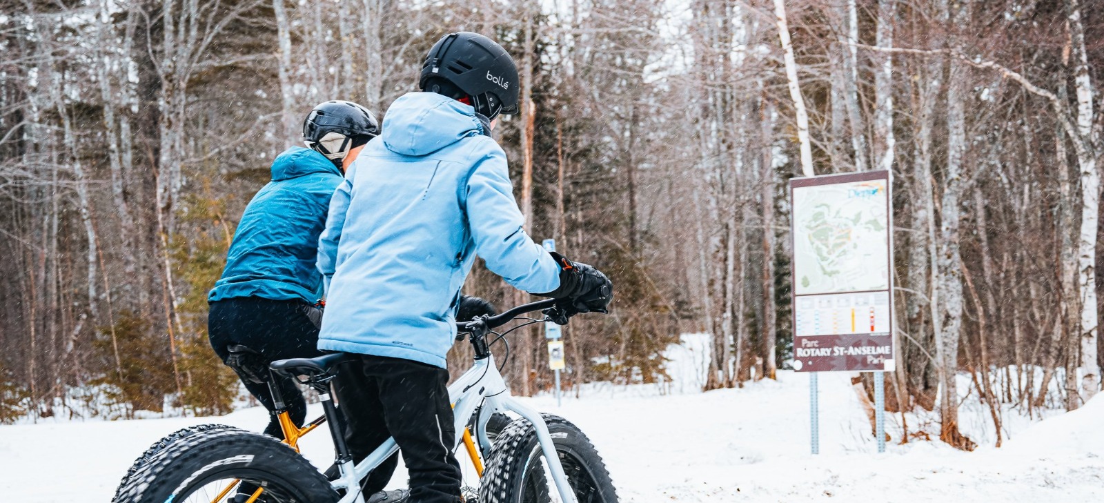 Father and son on a fat bike ride in St-Anselme Rotary Park
