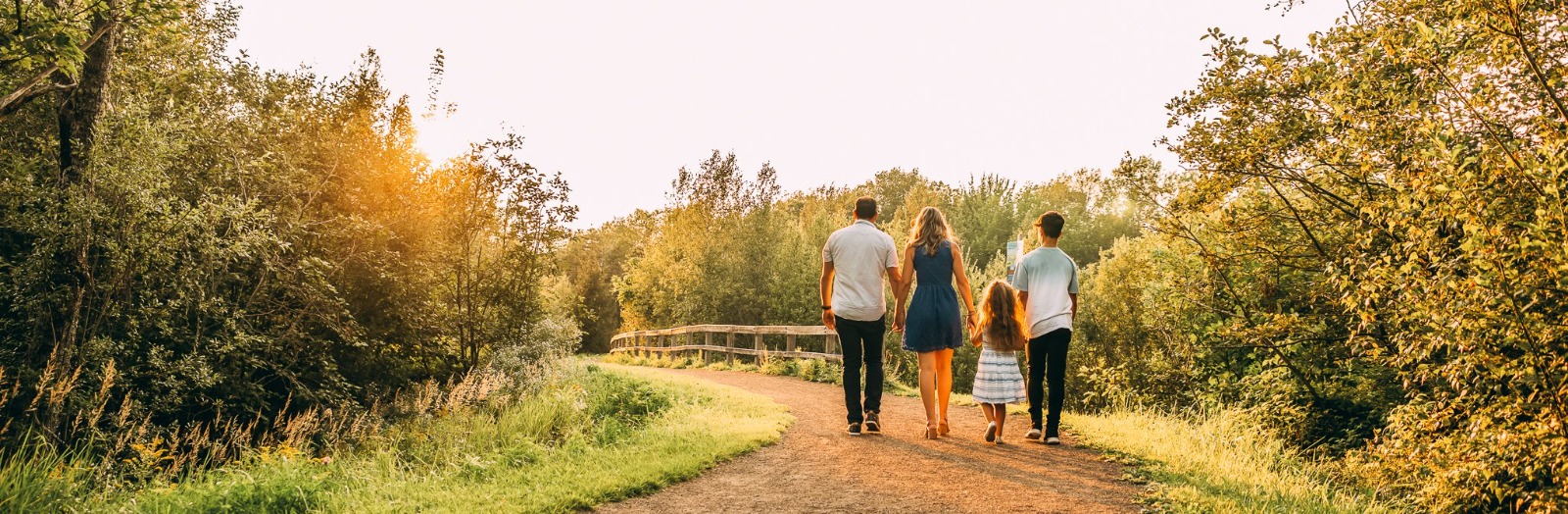 Family walking in one of Dieppe's trails